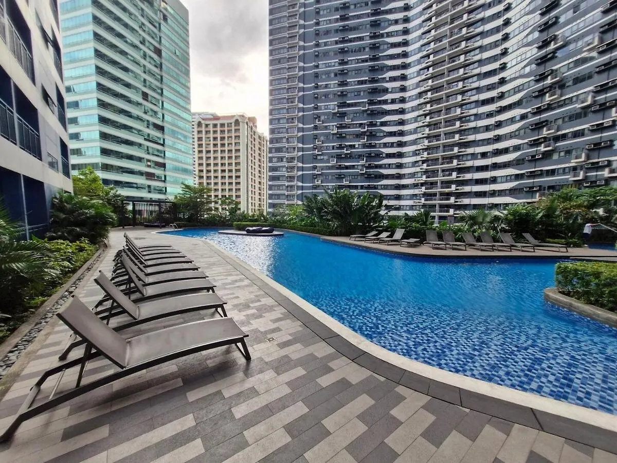 Luxurious 2 Bedroom Oasis In Air Residences With Bar Ktv And Games Manila